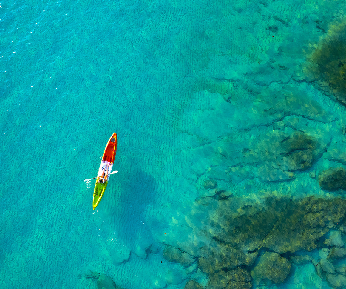 Canoe on turquoise water