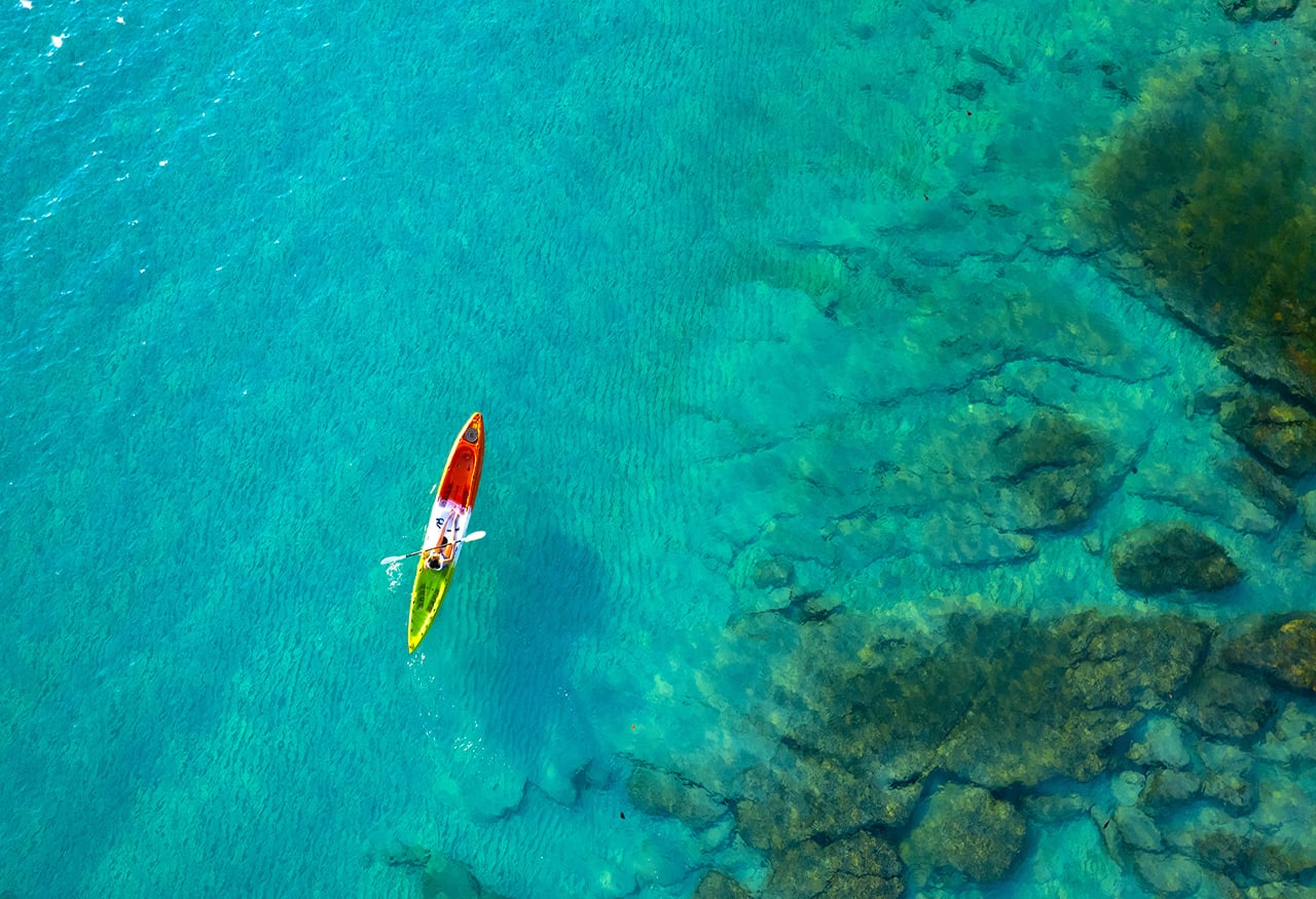 Canoe on turquoise water