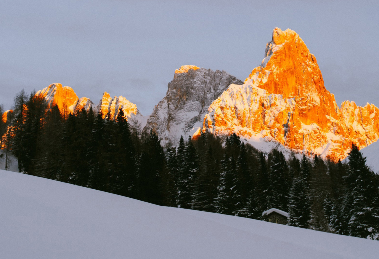 Sun against a mountainside