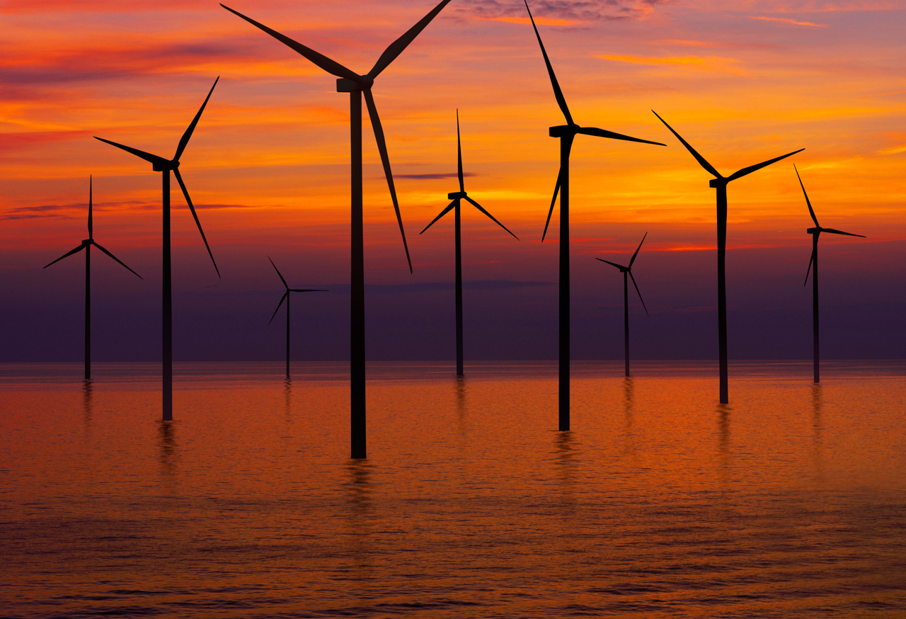 Offshore Wind Turbines At Sunset