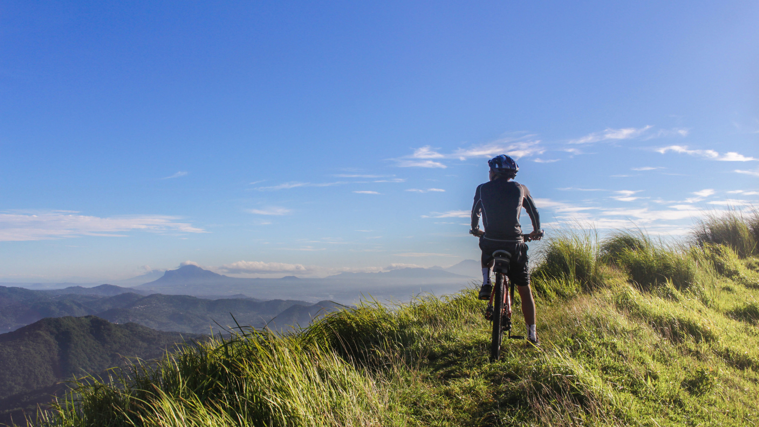 Cyclist on the top of a hill