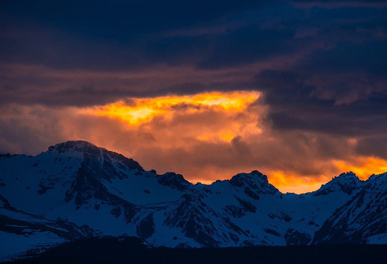 Sunset Over Snowy Mountain Range