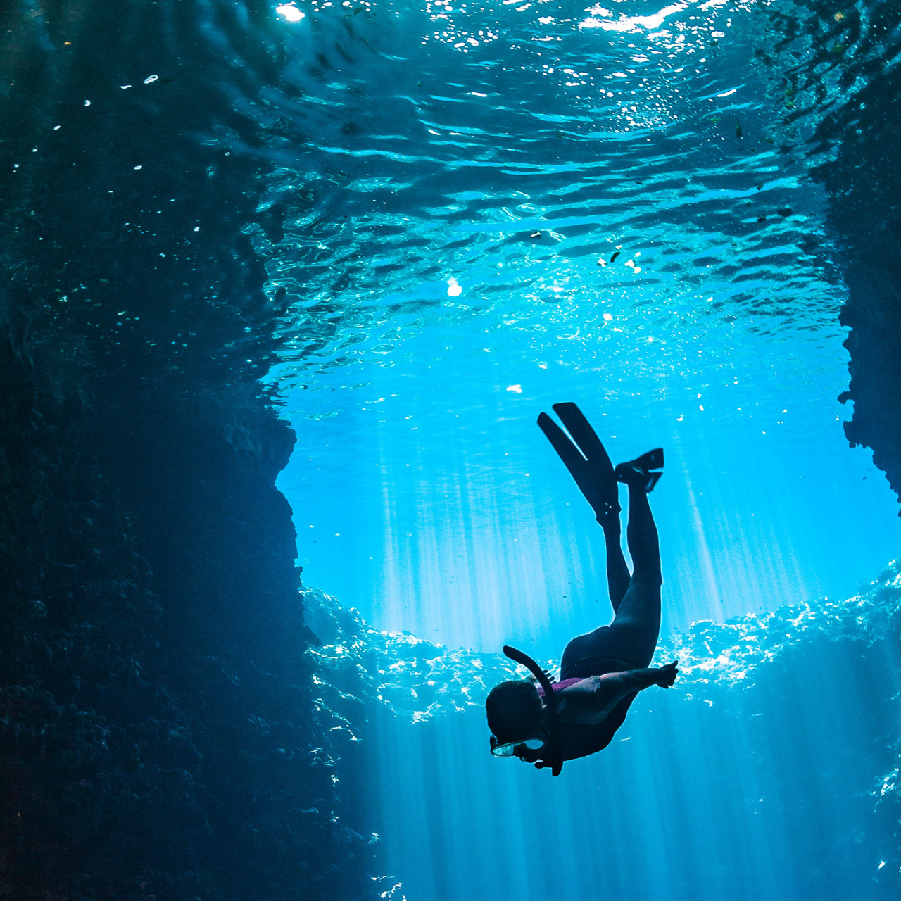 Woman diving into water