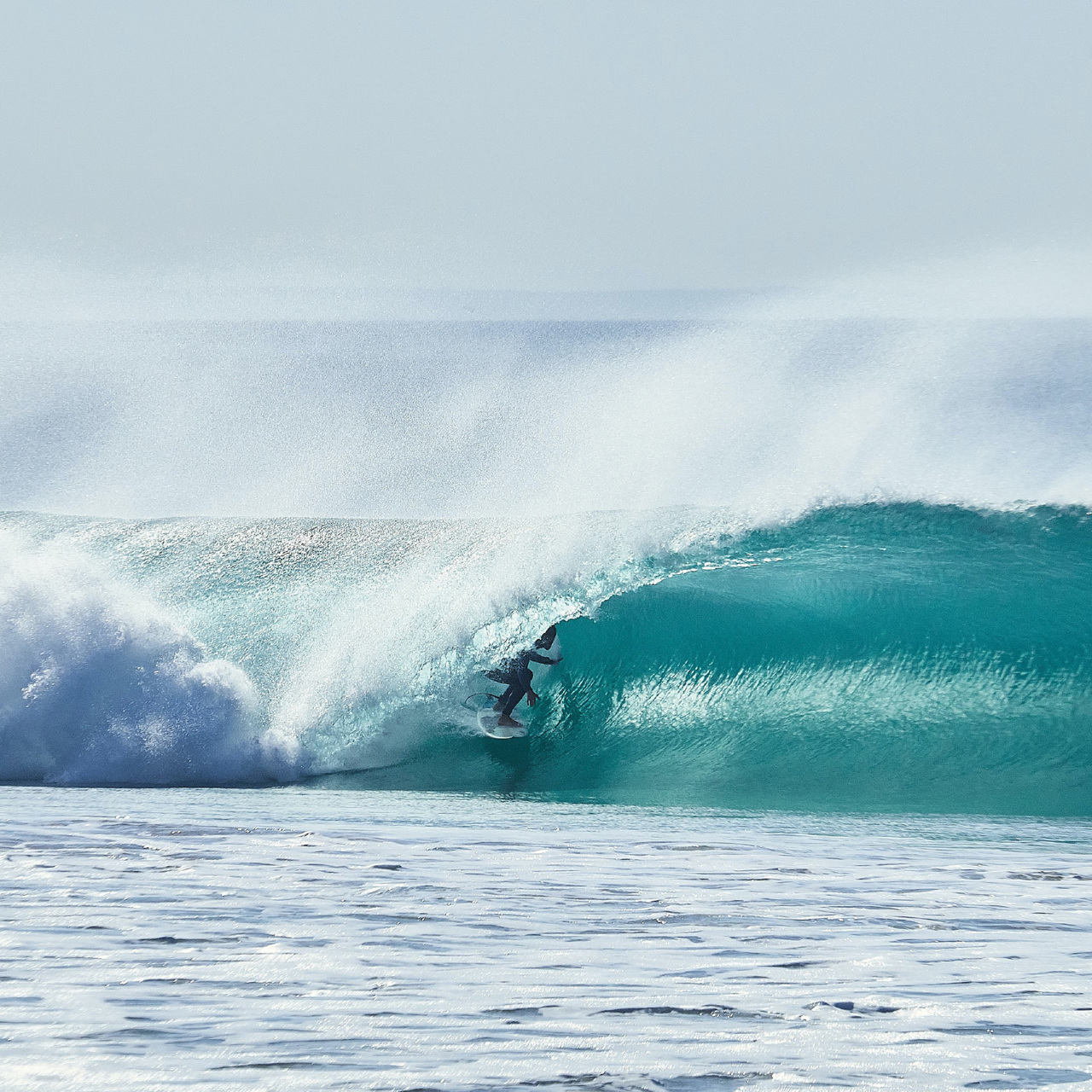 Surfer in a wave