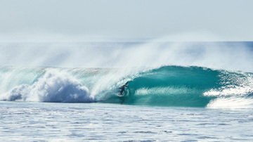 Surfer in a wave