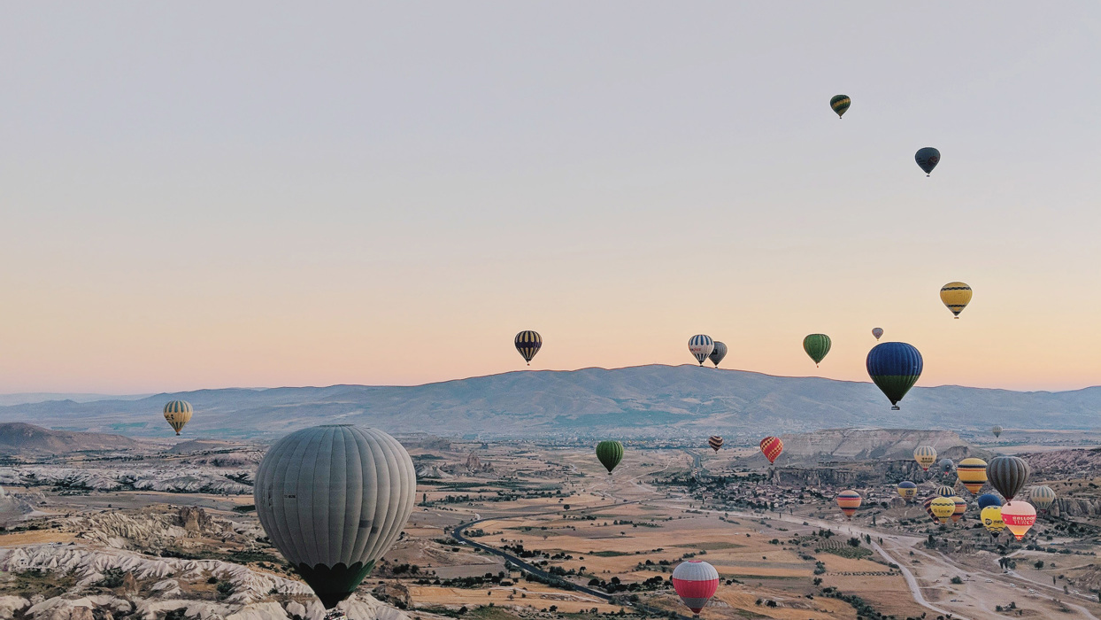 Hot air balloons over a desert