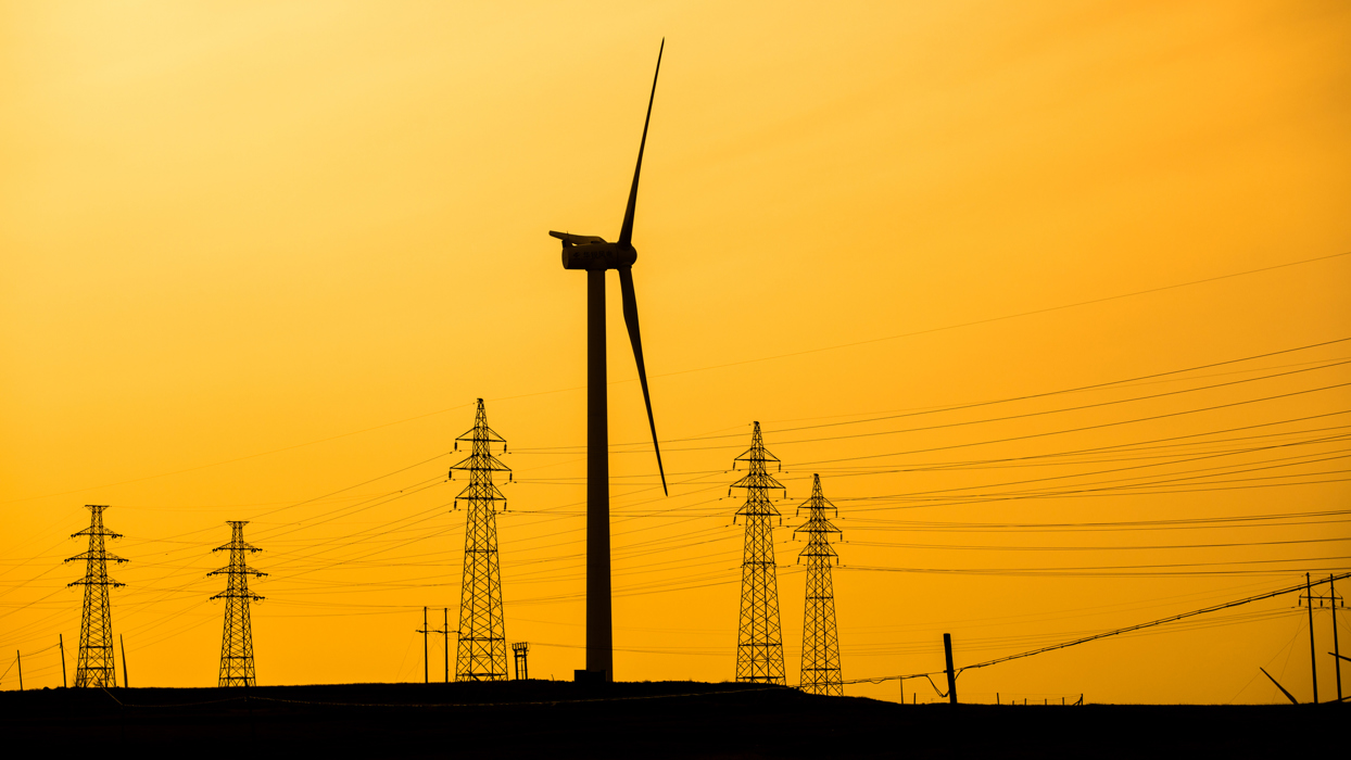 Transmission Pylons And Wind Turbines