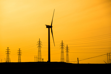 Transmission Pylons And Wind Turbines