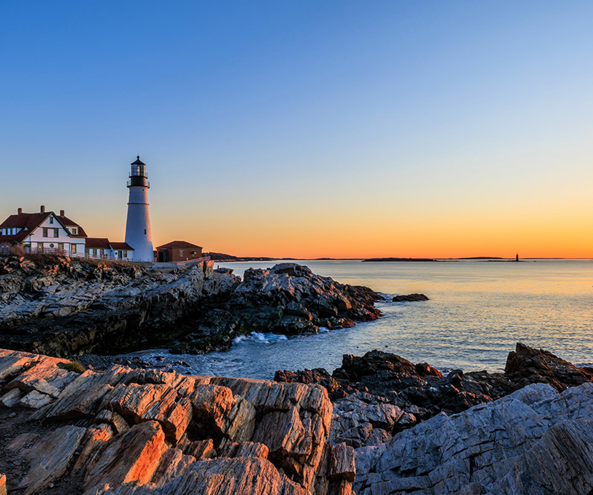 Lighthouse At Sunset