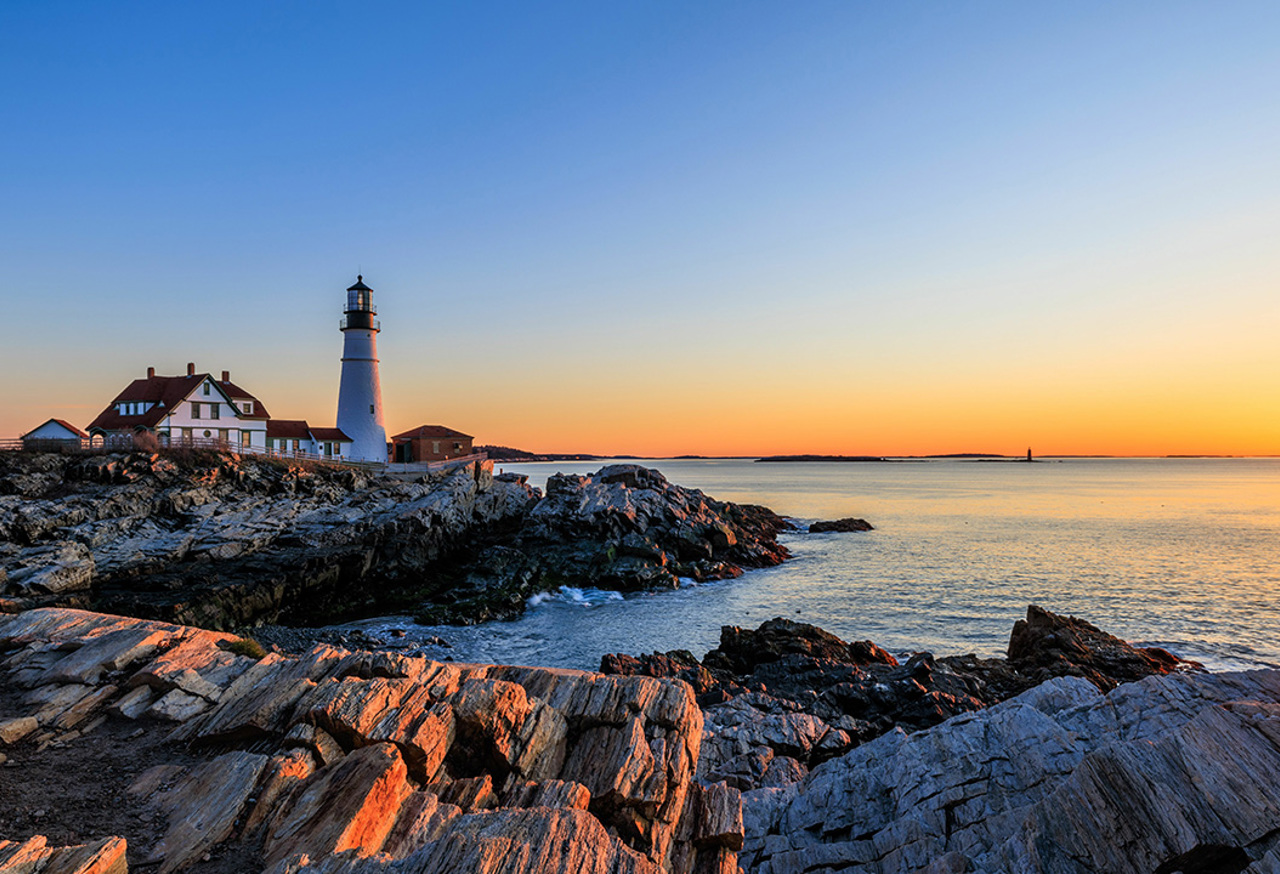 Lighthouse At Sunset