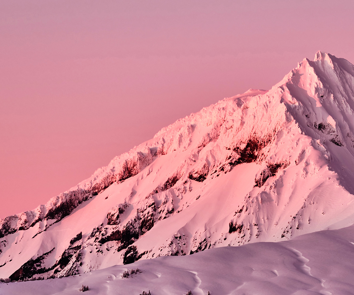 Mountain range against pink sky