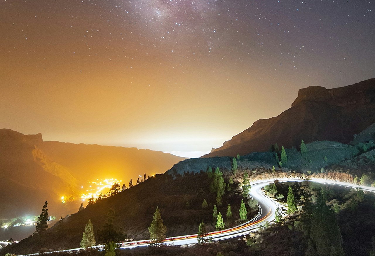 Highway Within Mountains At Night