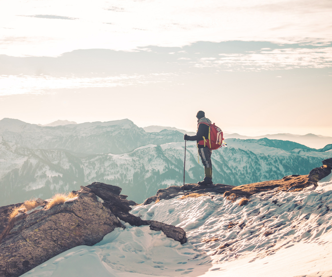 Man looking over mountains