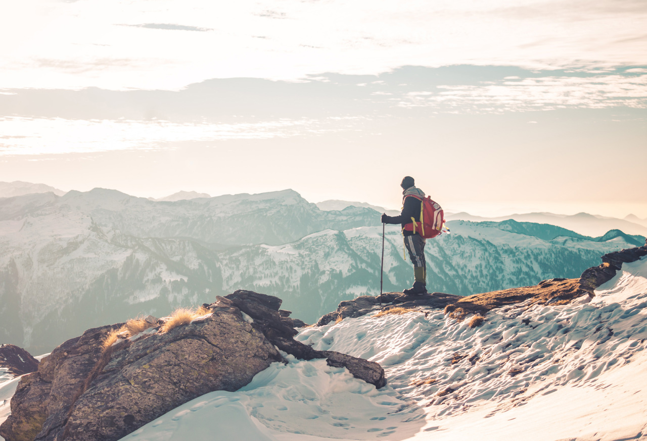 Man looking over mountains