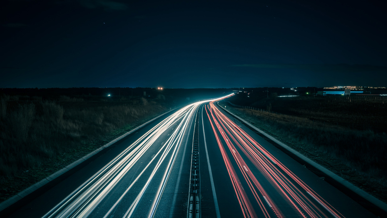 Road with long exposure car lights
