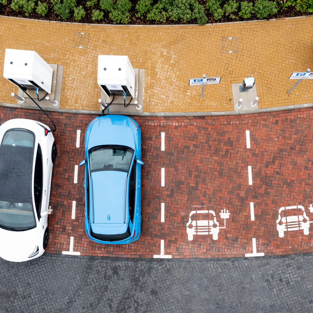 Electric Cars Charging At Public Chargepoint