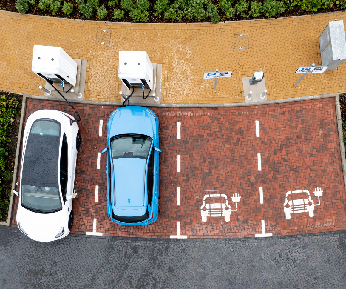 Electric Cars Charging At Public Chargepoint